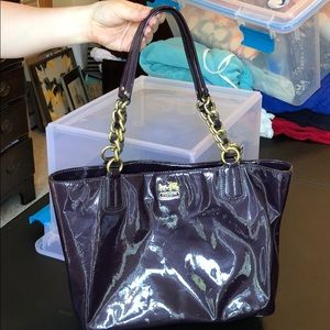 Deep purple Coach purse with gold accents